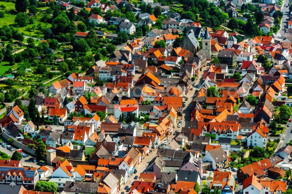 Aerial image Hochstadt - Town View of the streets and houses of the residential areas in Hochstadt in the state Hesse, Germany