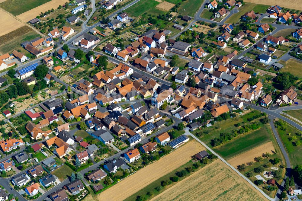 Aerial image Holzkirchhausen - Town View of the streets and houses of the residential areas in Holzkirchhausen in the state Bavaria, Germany