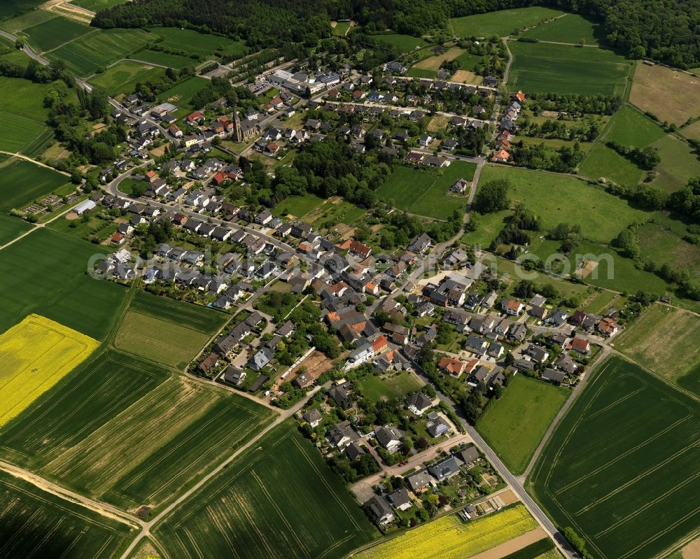 Grafschaft from the bird's eye view: View of the Holzweiler part of the borough of Grafschaft in the state of Rhineland-Palatinate. Holzweiler is one of eleven districts of Grafschaft and is located in the South of the borough next to a wooded area. It is home to the Panorama Sauna Holzweiler with its halls and open air swimming pools