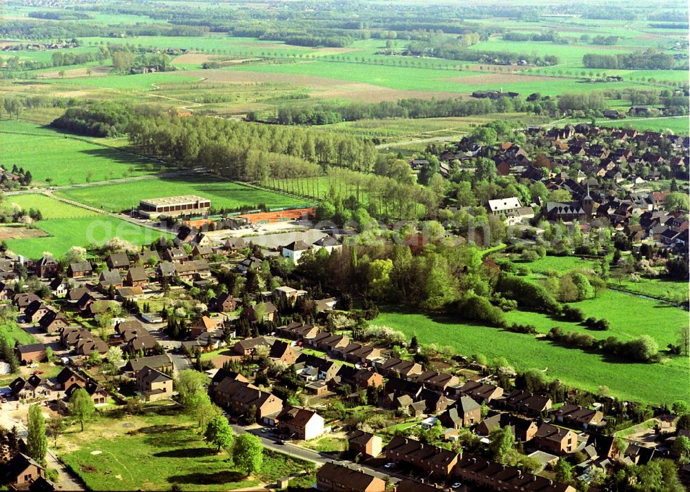 Issum from above - Town View of the streets and houses of the residential areas in Issum in the state North Rhine-Westphalia