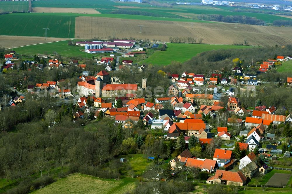 Aerial image Kapellendorf - View of the streets and houses of the residential areas and the moated castle in Kapellendorf in the state Thuringia, Germany