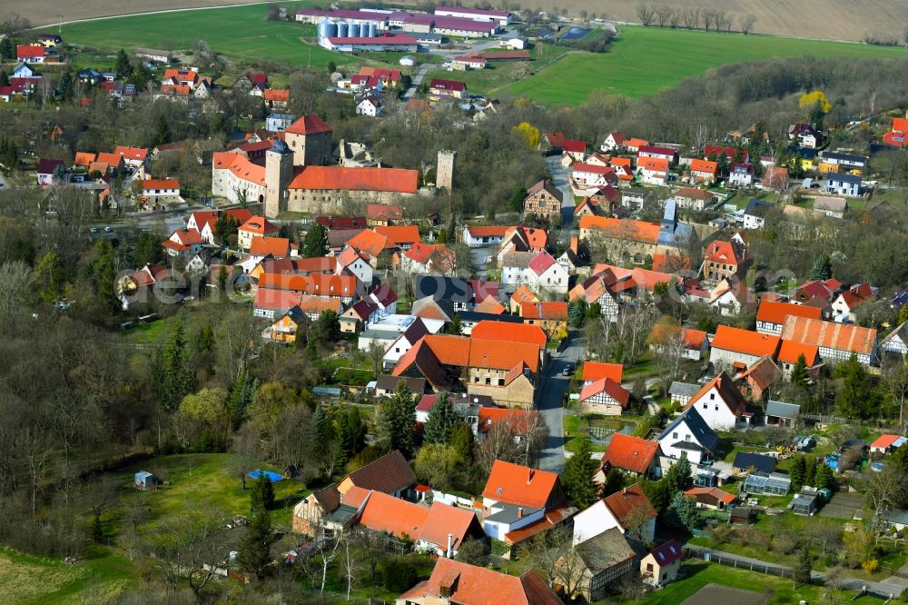 Aerial photograph Kapellendorf - View of the streets and houses of the residential areas and the moated castle in Kapellendorf in the state Thuringia, Germany