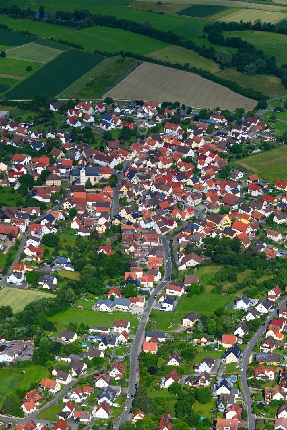 Aerial photograph Kirchehrenbach - Town View of the streets and houses of the residential areas in Kirchehrenbach in the state Bavaria, Germany