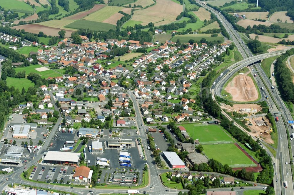 Aerial photograph Kirchheim - Town View of the streets and houses of the residential areas in Kirchheim in the state Hesse, Germany