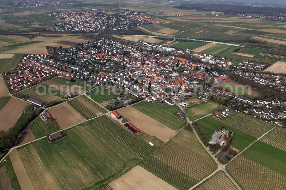 Aerial image Klein-Winternheim - Townscape of Klein-Winternheim and its surrounding landscape in the state of Rhineland-Palatinate. The borough is located in the Main-Bingen district neighbouring Ober-Olm and adjacent to the federal motorway A63. The borough's economy was dominated by viniculture and fruit cultivation and it is still surrounded by fields and agricultural spaces