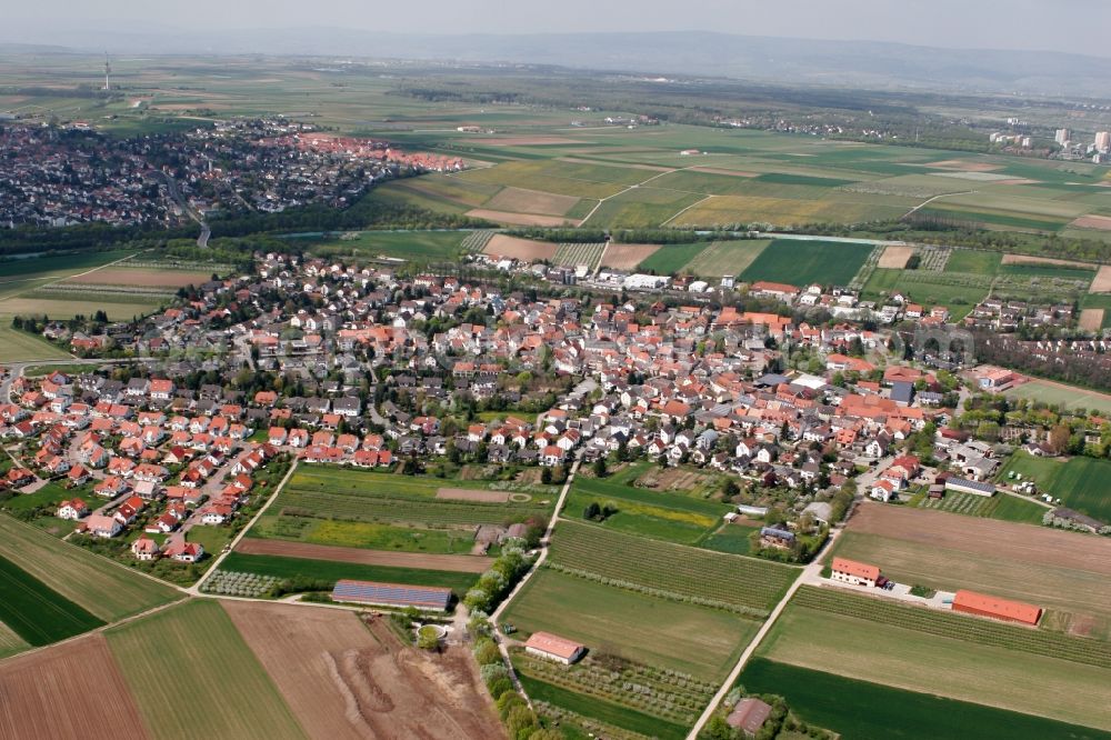 Klein-Winternheim from the bird's eye view: Townscape of Klein-Winternheim and its surrounding landscape in the state of Rhineland-Palatinate. The borough is located in the Main-Bingen district neighbouring Ober-Olm and adjacent to the federal motorway A63. The borough's economy was dominated by viniculture and fruit cultivation and it is still surrounded by fields and agricultural spaces