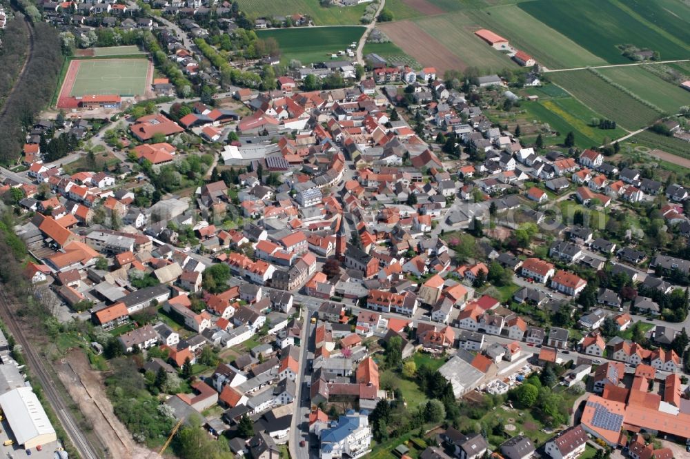 Aerial image Klein-Winternheim - Townscape of Klein-Winternheim and its surrounding landscape in the state of Rhineland-Palatinate. The borough is located in the Main-Bingen district neighbouring Ober-Olm and adjacent to the federal motorway A63. The borough's economy was dominated by viniculture and fruit cultivation and it is still surrounded by fields and agricultural spaces