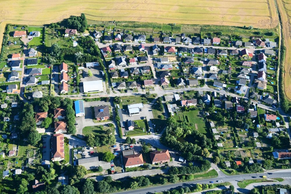 Küssow from above - Town View of the streets and houses of the residential areas in Kuessow in the state Mecklenburg - Western Pomerania, Germany