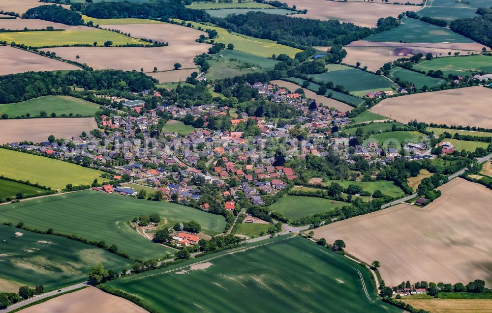 Aerial image Osterby - Town view with agricultural fields in Osterby in the state Schleswig-Holstein, Germany