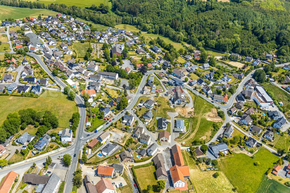 Langenholthausen from above - Town View of the streets and houses of the residential areas in Langenholthausen in the state North Rhine-Westphalia, Germany