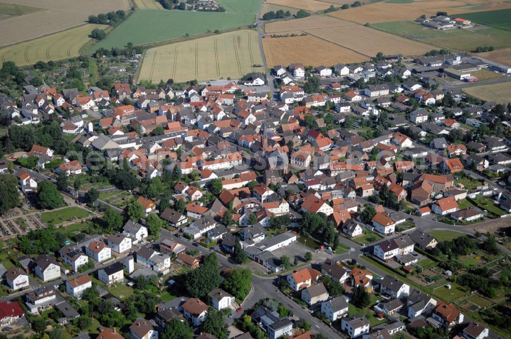 Aerial photograph Babenhausen - Ortsansicht Langstadt mit nogotischer evangelischer Kirche. Sie wurde von 1878 bis 1880 erbaut. Langstadt hat 1660 Einwohner. Kontakt: Stadt Babenhausen, Marktplatz 2, 64832 Babenhausen, Tel. +49(0)6073 602 0, Fax +49(0)6073 602 22, internet@babenhausen.de