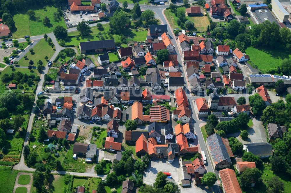 Liebenau from above - Town View of the streets and houses of the residential areas in Liebenau in the state Hesse, Germany