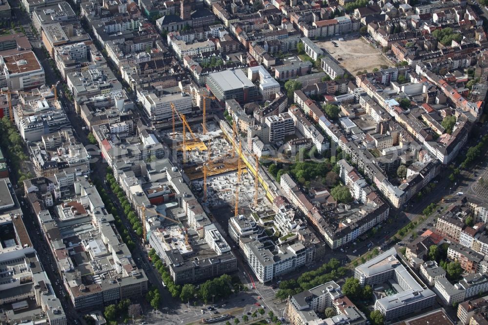 Aerial photograph Mannheim - Local view of Mannheim in the state of Baden Wurttemberg. DIRINGER & SCHEIDEL is building in Mannheim in the squares Q 6 and Q 7 a new district