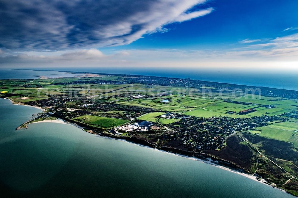 Aerial image Braderup (Sylt) - Town view on the sea coast in Braderup (Sylt) in sunset on the island of Sylt in the state Schleswig-Holstein, Germany