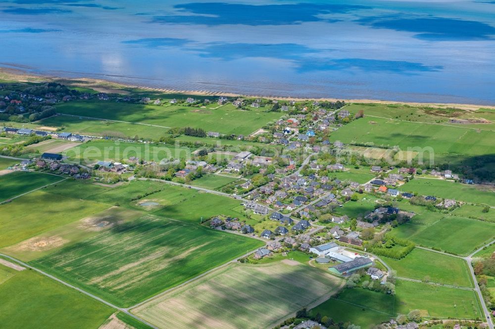 Aerial image Kleinmorsum - Townscape on the seacoast in Kleinmorsum at the Island Sylt in the state Schleswig-Holstein, Germany