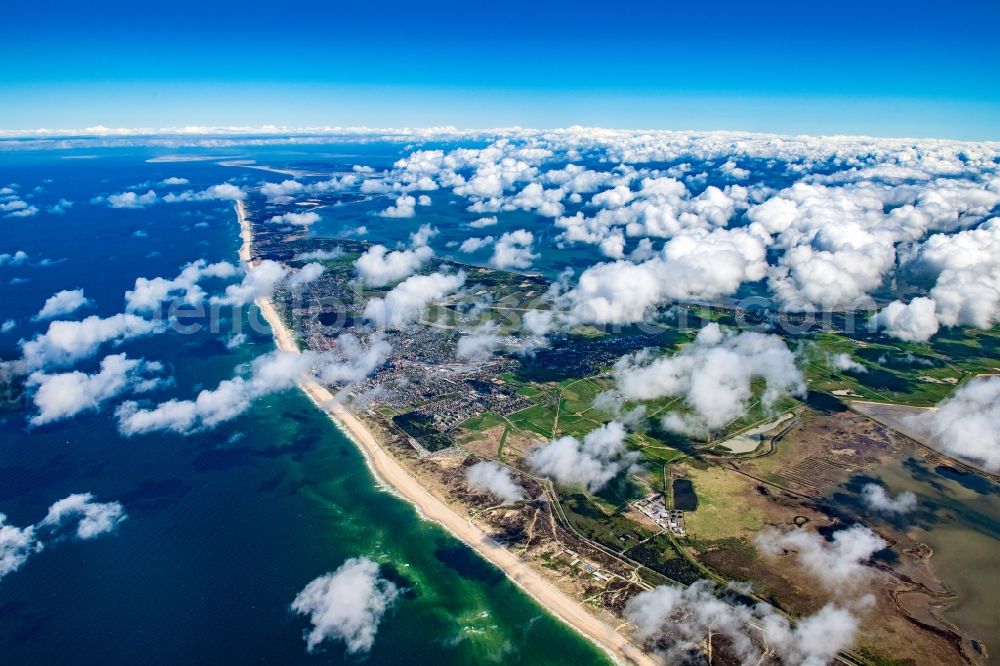 Aerial photograph Westerland - Townscape on the seacoast in Westerland at the island Sylt in clouds in the state Schleswig-Holstein, Germany