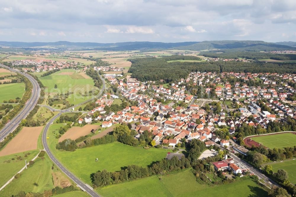 Aerial image Memmelsdorf - Town View of the streets and houses of the residential areas in Memmelsdorf in the state Bavaria, Germany