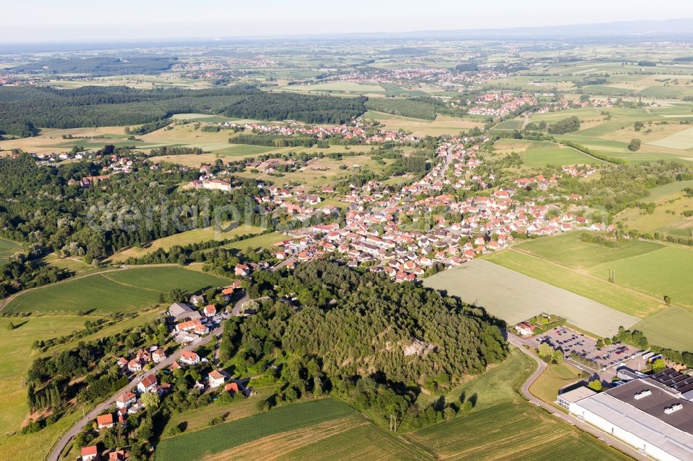 Merkwiller-Pechelbronn from above - Town View of the streets and houses of the residential areas in Merkwiller-Pechelbronn in Grand Est, France