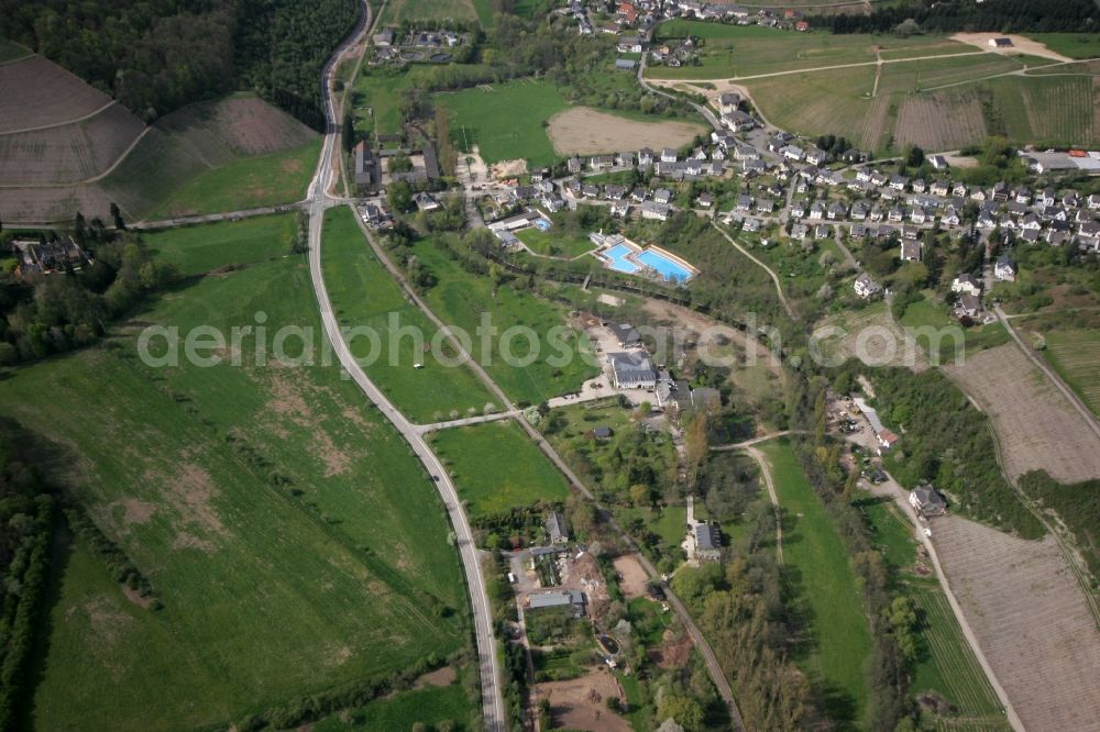 Mertesdorf from the bird's eye view: View of Mertesdorf in the state of Rhineland-Palatinate. Mertesdorf is a wine-growing village in the valley of the river Ruwer near Trier and an official resort. The village is surrounded by vineyards and hills and consists of historic and residential buildings