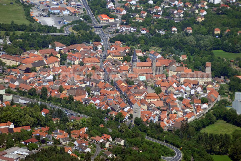 Aerial image Münnerstadt - Blick auf den Ort Münnerstadt. Münnerstadt ist eine Stadt im unterfränkischen Landkreis Bad Kissingen. Das Gebiet der heutigen Stadt Münnerstadt ist uraltes Siedlungsgebiet. Reiche Funde von der Jungsteinzeit (4500-2100 v. Chr.) bis zur Hallstattzeit (ab 750 v. Chr.) beweisen, dass schon vor Jahrtausenden Jahren Menschen hier Wälder rodeten, Felder bestellten und Handel trieben. Gerade im östlichen Stadtgebiet, im Umfeld der Stadtteile Großwenkheim, Maria Bildhausen und Althausen, bearbeiteten die keltischen Siedler die fruchtbaren Böden des hier beginnenden Grabfeldes.