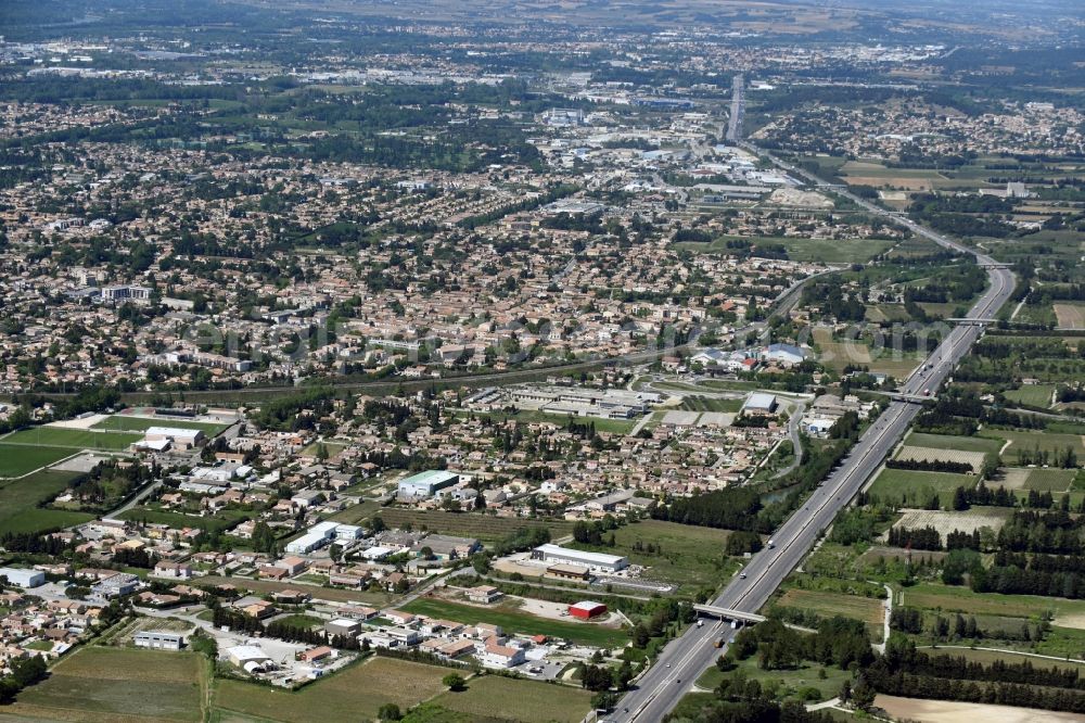 Morieres-les-Avignon from above - Town View of the streets and houses of the residential areas in Morieres-les-Avignon in Provence-Alpes-Cote d'Azur, France