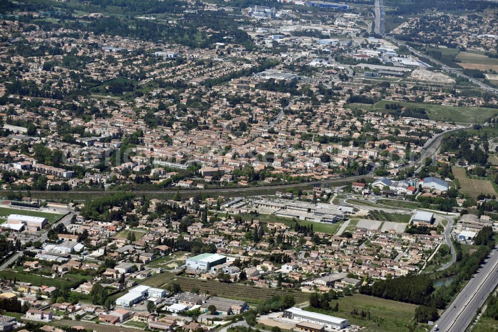 Aerial image Morieres-les-Avignon - Town View of the streets and houses of the residential areas in Morieres-les-Avignon in Provence-Alpes-Cote d'Azur, France