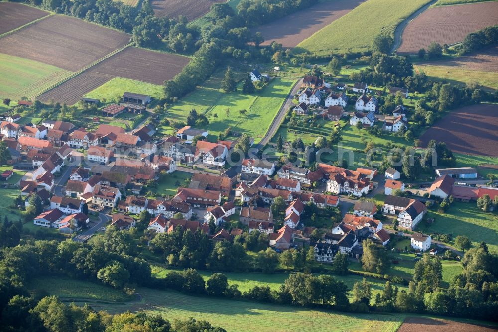 Mörshausen from above - Town View of the streets and houses of the residential areas in Moershausen in the state Hesse, Germany