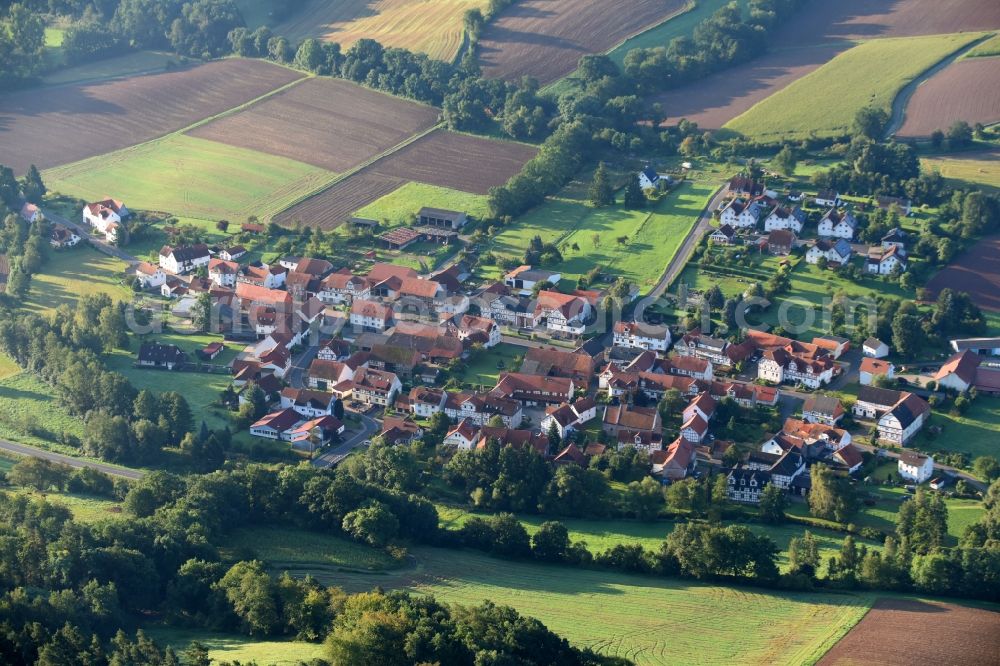 Mörshausen from the bird's eye view: Town View of the streets and houses of the residential areas in Moershausen in the state Hesse, Germany