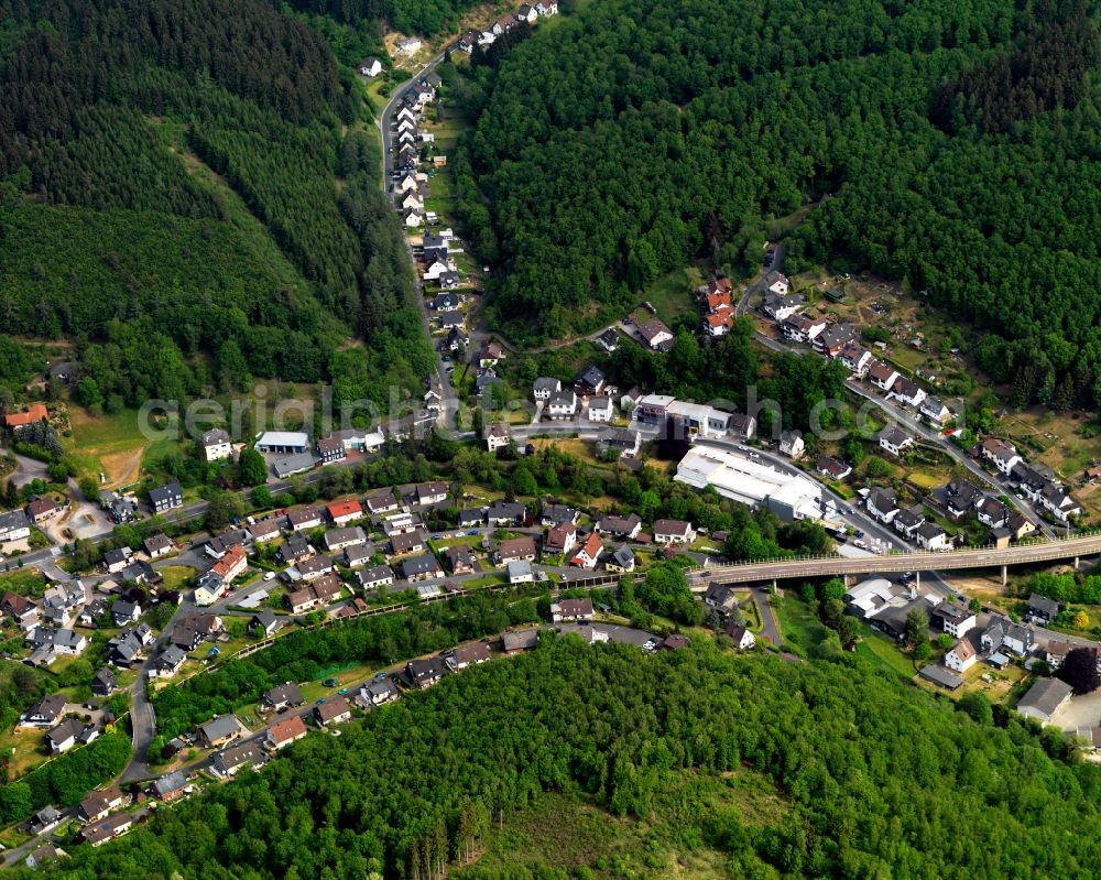 Aerial image Niederfischbach - View of the borough of Niederfischbach in the state of Rhineland-Palatinate. The borough is located in the West of the Giebel Forest and is characterised by agriculture and wooded hills. The creeks Asdorf and Fischbach take their courses through the borough