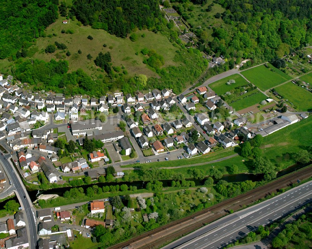 Niederscheld from the bird's eye view: Town View of the streets and houses of the residential areas in Niederscheld in the state Hesse, Germany