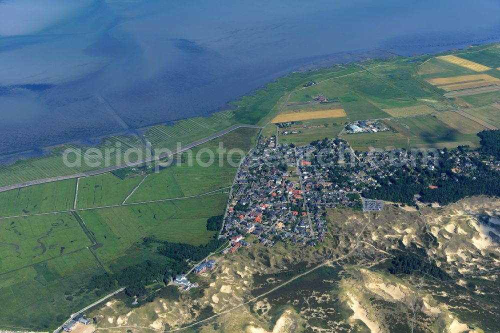 Norddorf from above - Town View of the streets and houses of the residential areas on the North Sea island Amrum in Norddorf at the coast in the state Schleswig-Holstein