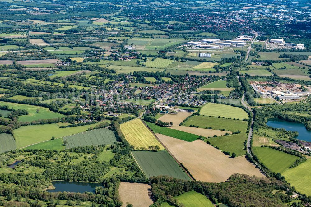 Nützen from above - Town View of the streets and houses of the residential areas in Nuetzen in the state Schleswig-Holstein, Germany