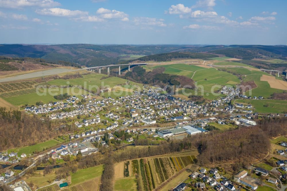 Aerial photograph Nuttlar - Town View of the streets and houses of the residential areas in Nuttlar in the state North Rhine-Westphalia, Germany