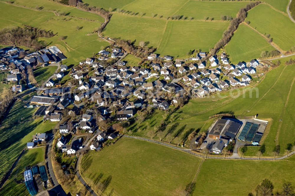 Aerial image Oberhenneborn - Town View of the streets and houses of the residential areas in Oberhenneborn at Sauerland in the state North Rhine-Westphalia, Germany