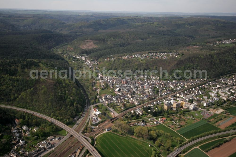 Aerial photograph Trier - View of the district of Ehrang in Trier in the state of Rhineland-Palatinate. Ehrang is located amidst hills and forest on the federal motorway (Autobahn) A64 on the left shore of the river Mosel. Ehrang is the largest district of the city and is located in its North