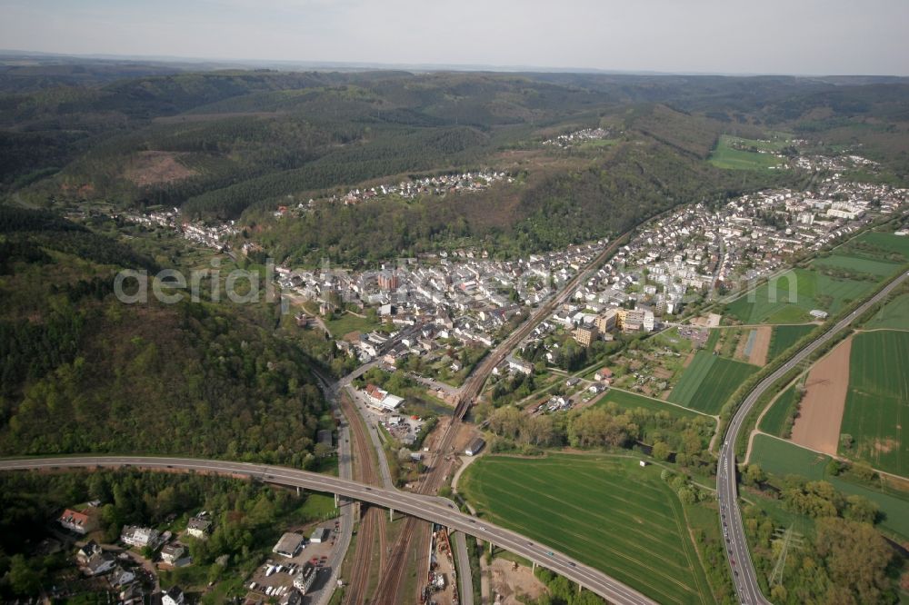 Trier from the bird's eye view: View of the district of Ehrang in Trier in the state of Rhineland-Palatinate. Ehrang is located amidst hills and forest on the federal motorway (Autobahn) A64 on the left shore of the river Mosel. Ehrang is the largest district of the city and is located in its North