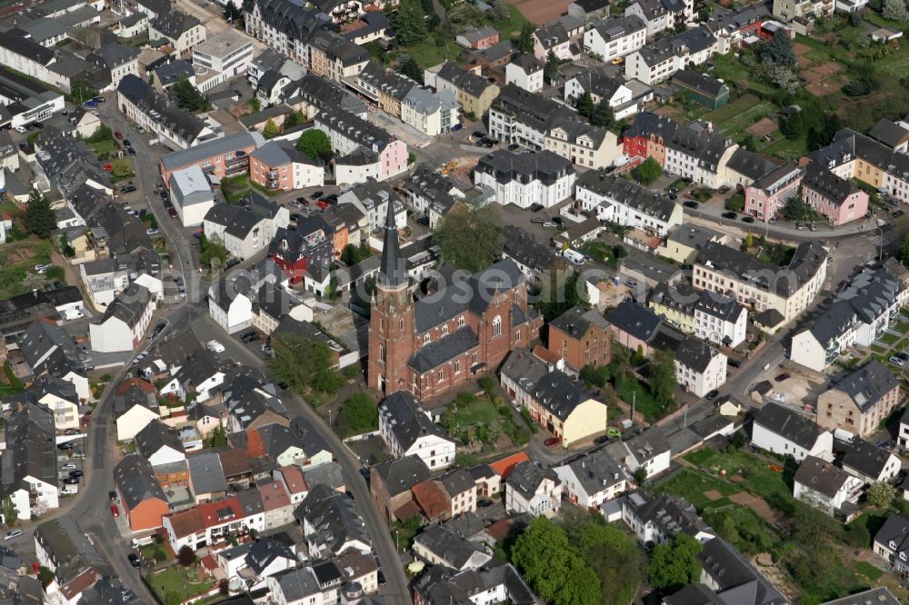 Aerial photograph Trier - View of the district of Euren in Trier in the state of Rhineland-Palatinate. Euren is located amidst hills and forest on the left shore of the river Mosel. The catholic parochial church Saint Helena with its distinct red-brown colour and its tower is one of the landmarks of the district