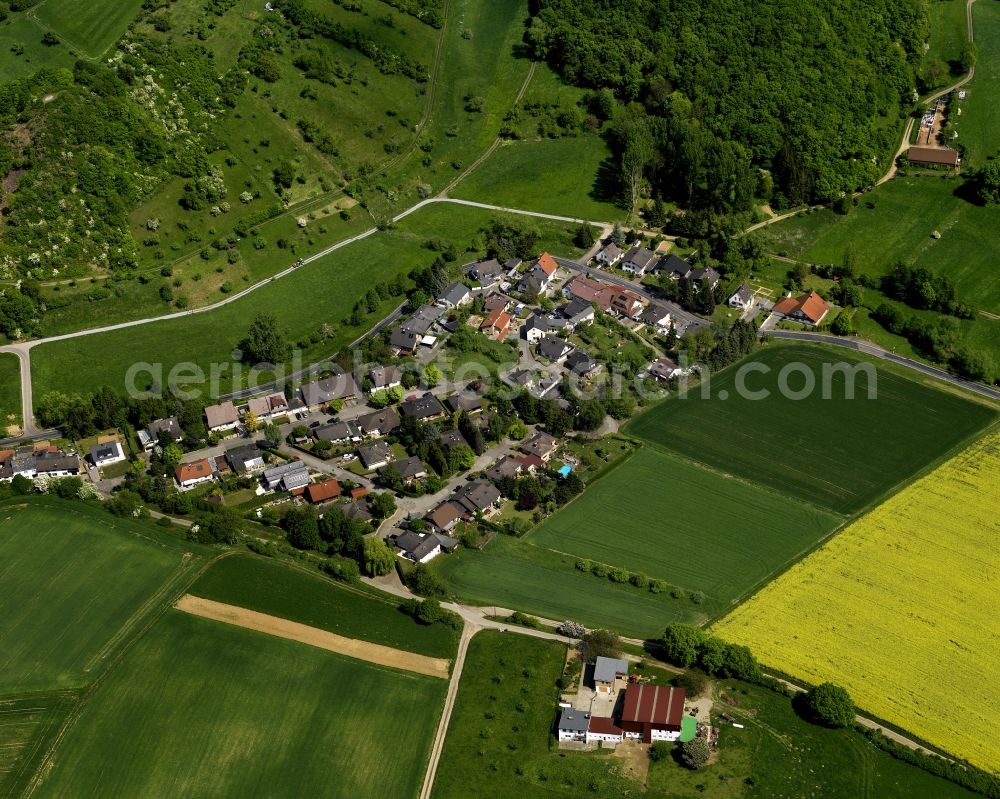 Grafschaft from the bird's eye view: View of the district of Nierendorf in the borough of Grafschaft in the state of Rhineland-Palatinate. Nierendorf is located on a small wooded hill and surrounded by fields and agricultural land