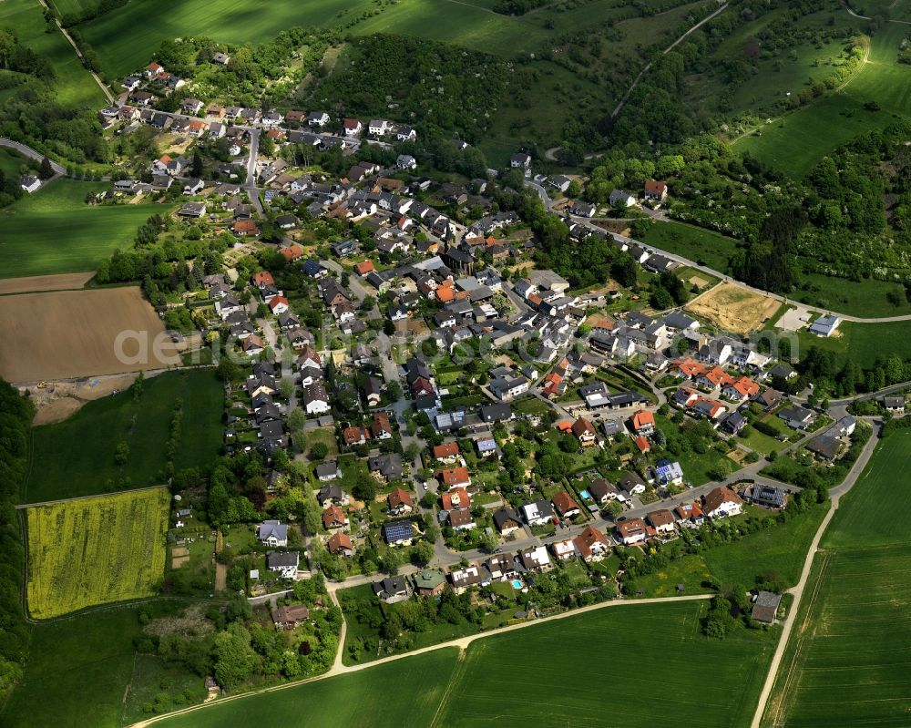 Aerial image Grafschaft - View of the district of Nierendorf in the borough of Grafschaft in the state of Rhineland-Palatinate. Nierendorf is located on a small wooded hill and surrounded by fields and agricultural land