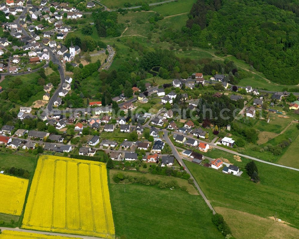 Aerial image Alsbach - View of Alsbach in the state of Rhineland-Palatinate. The borough and municipiality is located in the county district of Westerwaldkreis in the low mountain range of Westerwald - the so called Kannenbaeckerland. Alsbach is surrounded by agricultural land, hills, canola fields and meadows