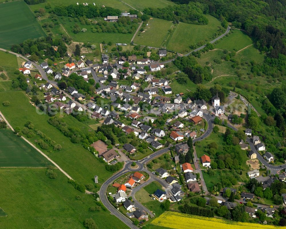 Aerial photograph Alsbach - View of Alsbach in the state of Rhineland-Palatinate. The borough and municipiality is located in the county district of Westerwaldkreis in the low mountain range of Westerwald - the so called Kannenbaeckerland. Alsbach is surrounded by agricultural land, hills, canola fields and meadows