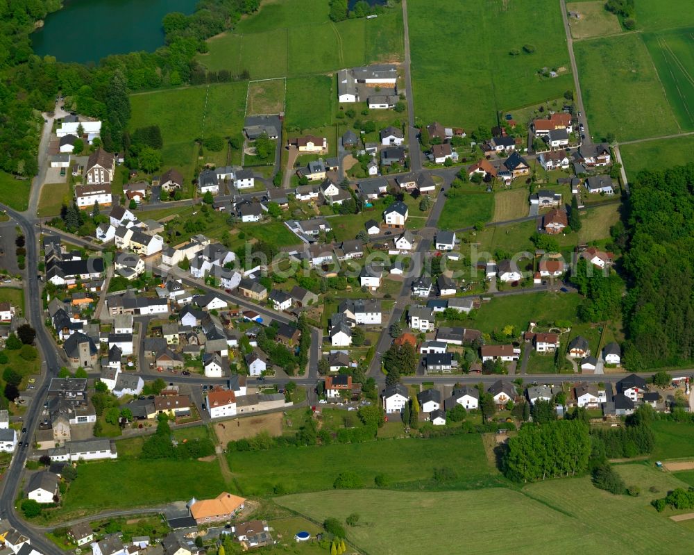 Bannberscheid from above - View of Bannberscheid in the state of Rhineland-Palatinate. The borough and municipiality is located in the county district of Westerwaldkreis in the low mountain range of Westerwald - the so called Kannenbaeckerland. Bannberscheid is surrounded by agricultural land and meadows