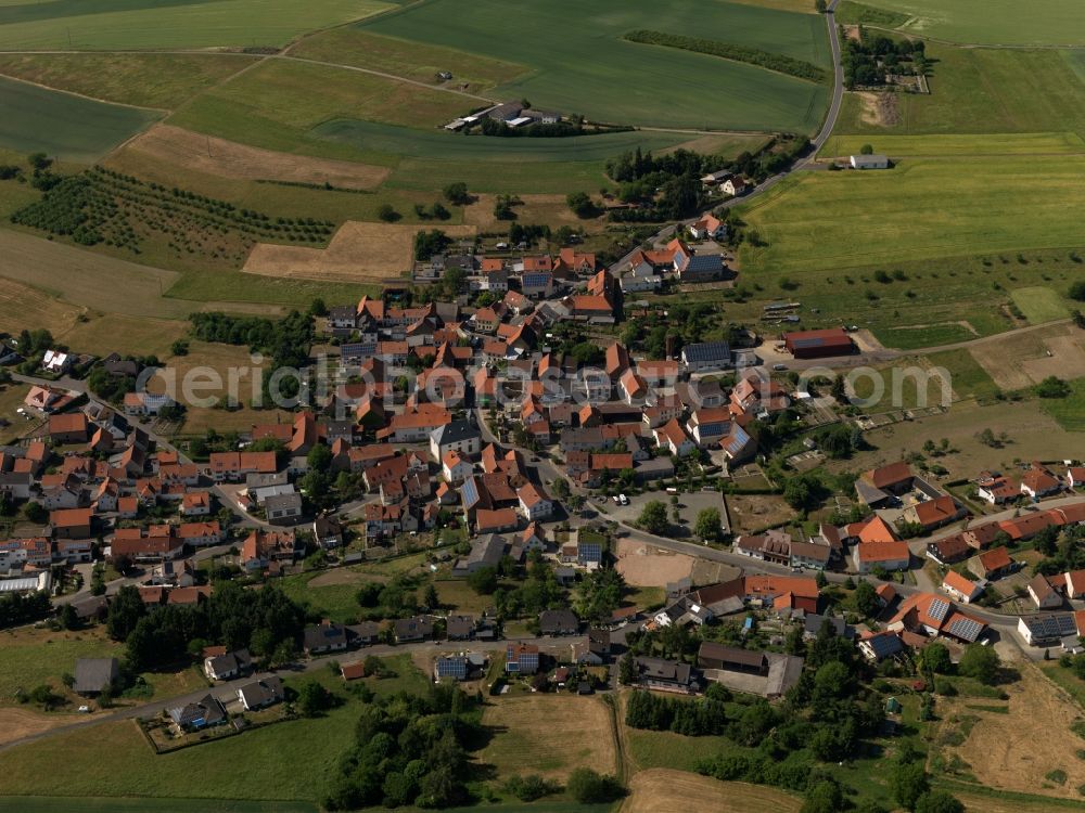 Aerial photograph Becherbach - View of the borough and municipiality of Becherbach in the state of Rhineland-Palatinate. The agricultural borough is located in the county district of Bad Kreuznach. Surrounded by fields, hills and forest, the village with its parts and hamlets is located in the Palatinate region