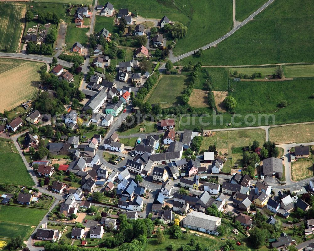 Aerial image Bettendorf - View of the borough of Bettendorf in the state of Rhineland-Palatinate. The borough and municipiality is located in the county district of Rhine-Lahn, in the Western Hintertaunus mountain region. The agricultural village consists of residential areas and is surrounded by rapeseed fields and meadows