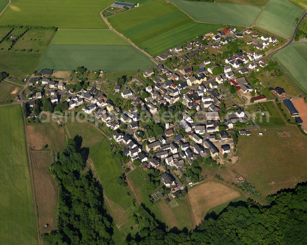 Biebrich from above - View of the borough of Biebrich in the state of Rhineland-Palatinate. The borough and municipiality is located in the county district of Rhine-Lahn. The village consists of residential buiildings and areas, sits in the Western Taunus mountain range and is surrounded by meadows and fields