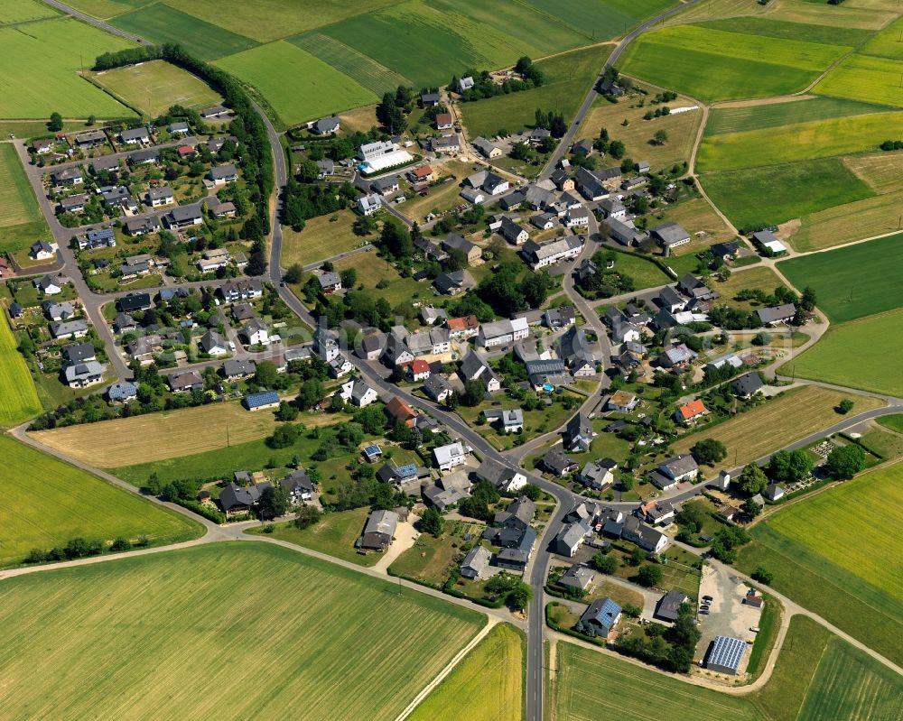 Aerial image Breitenthal - View of Breitenthal in the state of Rhineland-Palatinate. The borough and municipiality is located in the county district of Birkenfeld, in a bend of the Hosenbach creek in the Hunsrueck region. It is surrounded by agricultural land, meadows and forest