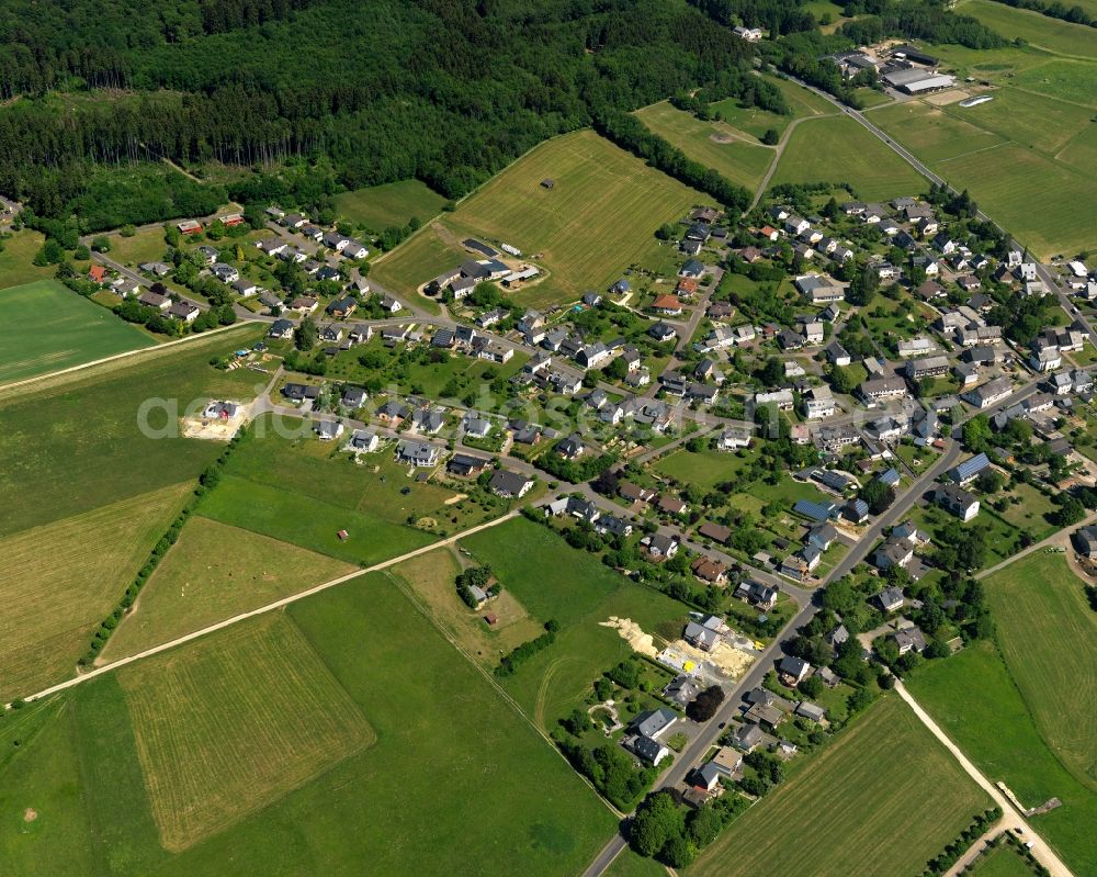 Aerial image Bruchweiler - View of Bruchweiler in the state of Rhineland-Palatinate. The borough and municipiality is an official spa resort and located in the county district of Birkenfeld, in the Hunsrueck region. It is surrounded by agricultural land, meadows and forest. A clinic for youth and children rehab is located outside the core of the village