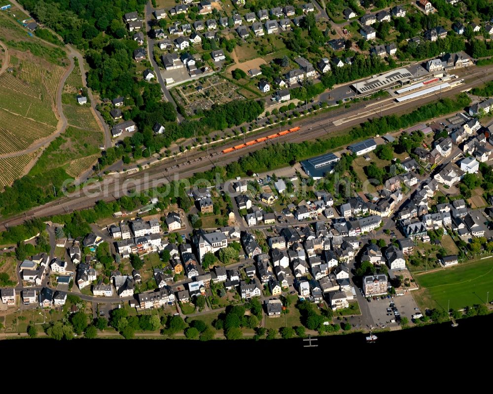 Aerial photograph Bullay - View of the borough and municipiality of Bullay in the state of Rhineland-Palatinate. The official tourist resort and wine-growing town is part of the Cochem-Zell county district and is located on the right riverbank of the Moselle. Bullay is home to Germany's first double floor bridge which connects Alf and Bullay over the river Moselle. The awarded ecological train station is located in the centre of the town