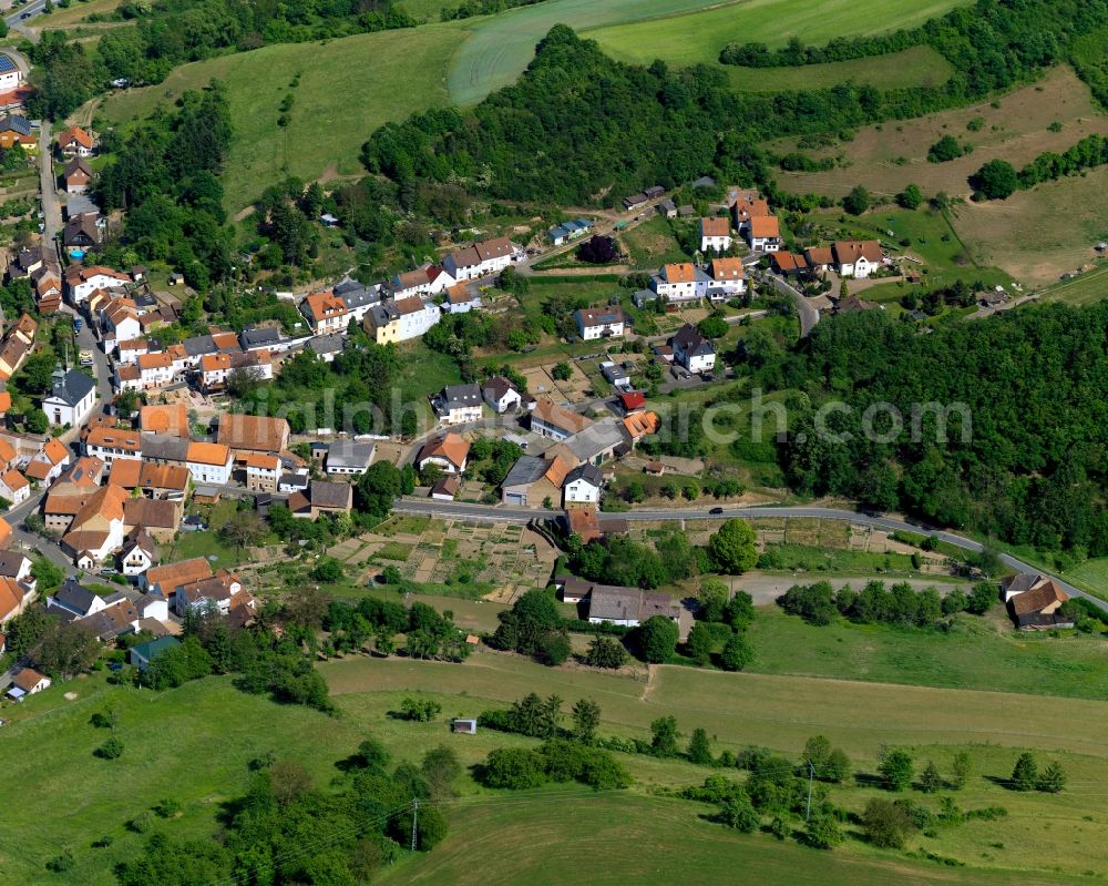 Callbach from above - View of the borough and municipiality of Callbach in the state of Rhineland-Palatinate. The agricultural borough is located in the county district of Bad Kreuznach. Surrounded by fields, hills and forest, the village is located in the mountain range of Northern Palatinate - in the valley of the Eschenbach creek