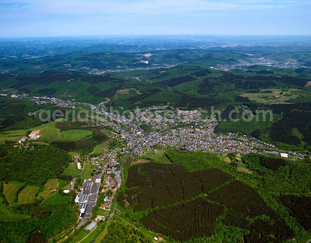 Aerial image Daaden - View of Daaden in the state of Rhineland-Palatinate. The borough and municipiality Daaden is located in the county district of Altenkirchen in the Westerwald forest region and surrounded by fields, meadows and forest. The river Daade takes its course through the official tourist resort